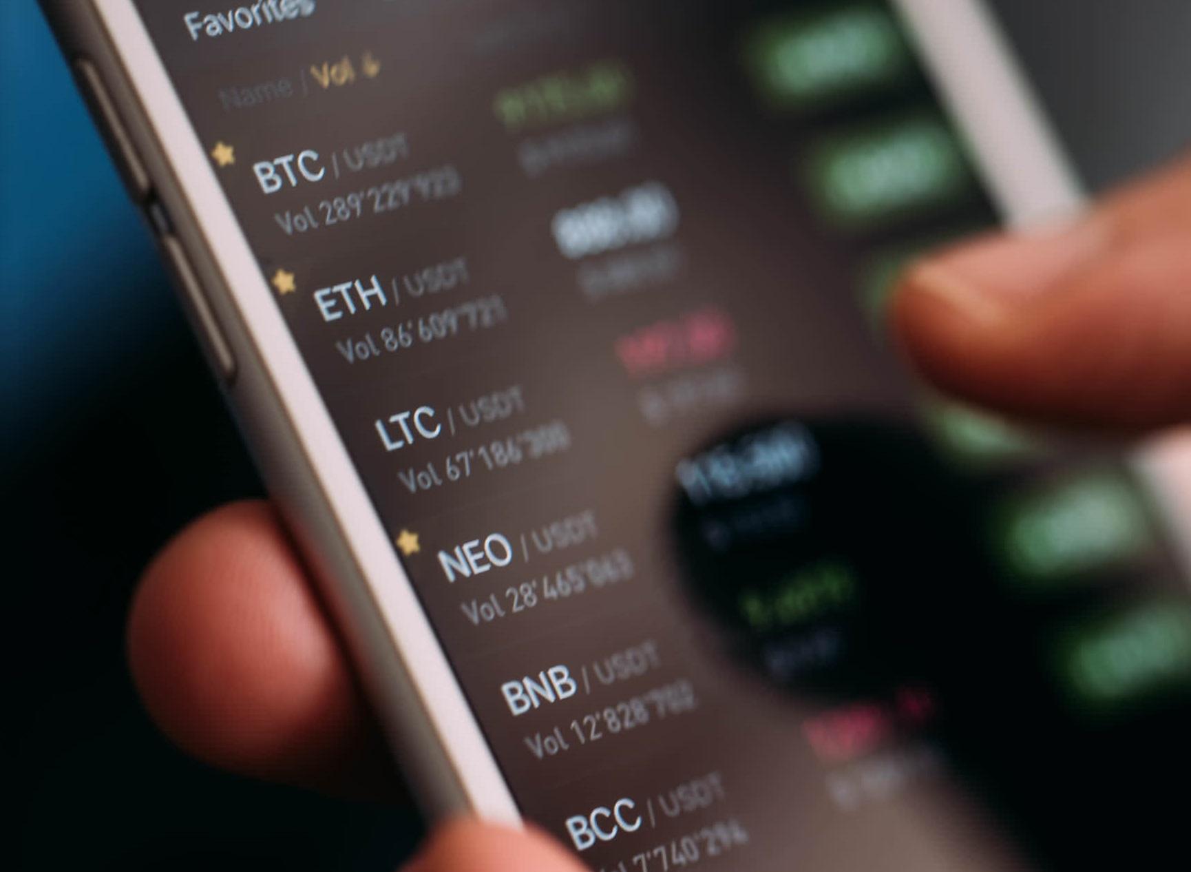 A close-up of a person using a financial app.