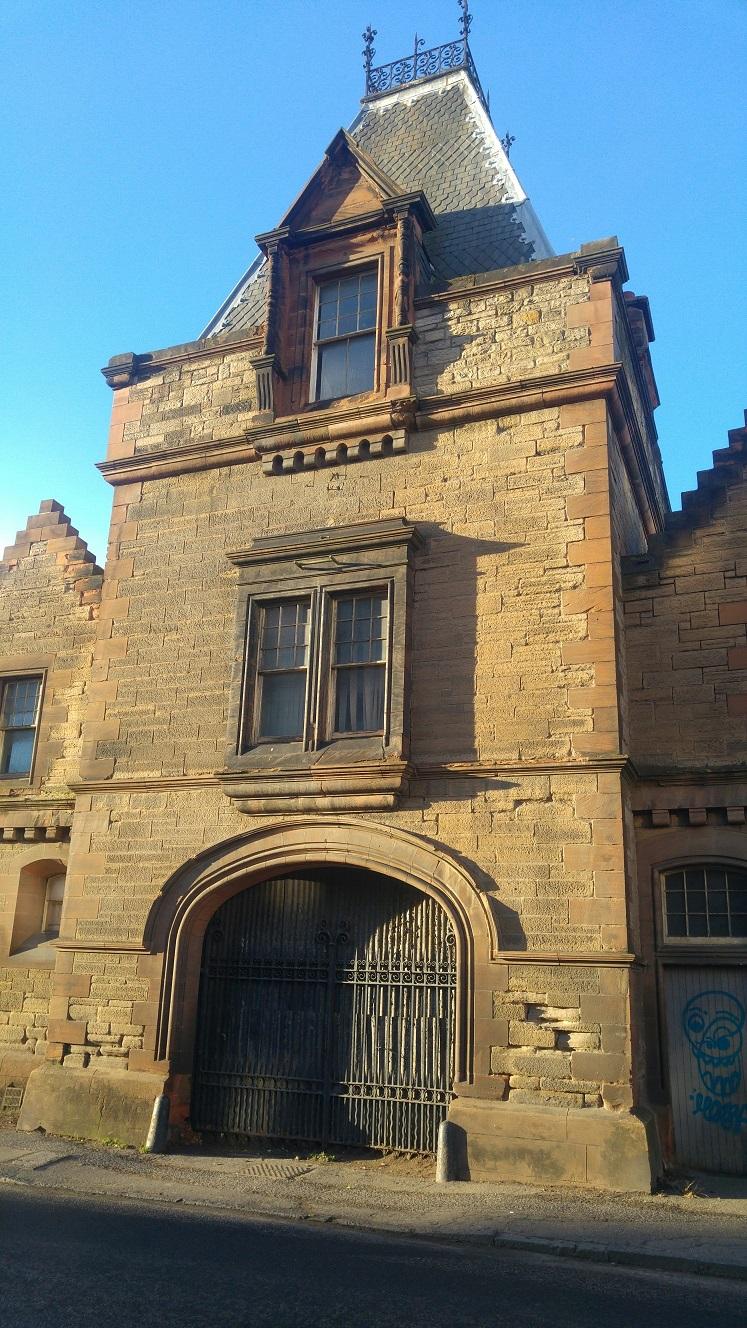 A photograph of the "Powderhall Stables" building in Powderhall, Edinburgh.