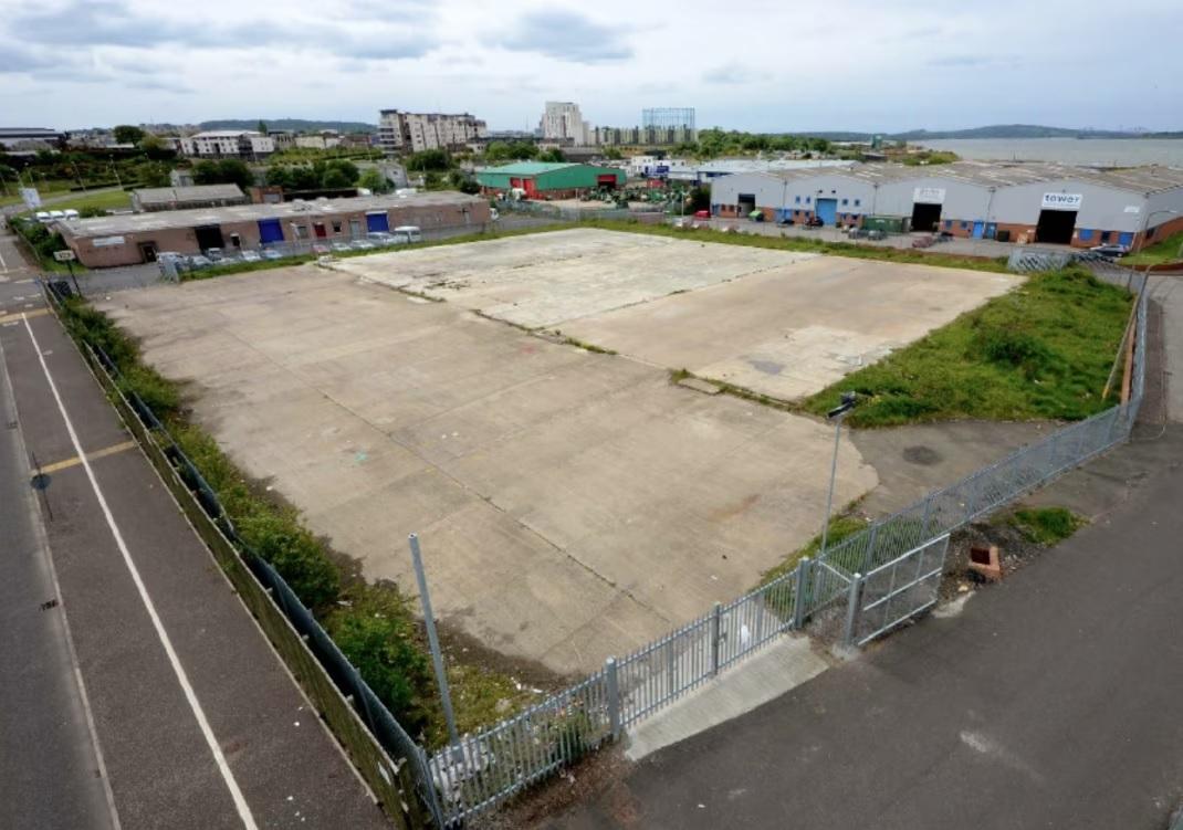 A photograph of a vacant plot of land at Granton Harbour in Edinburgh.
