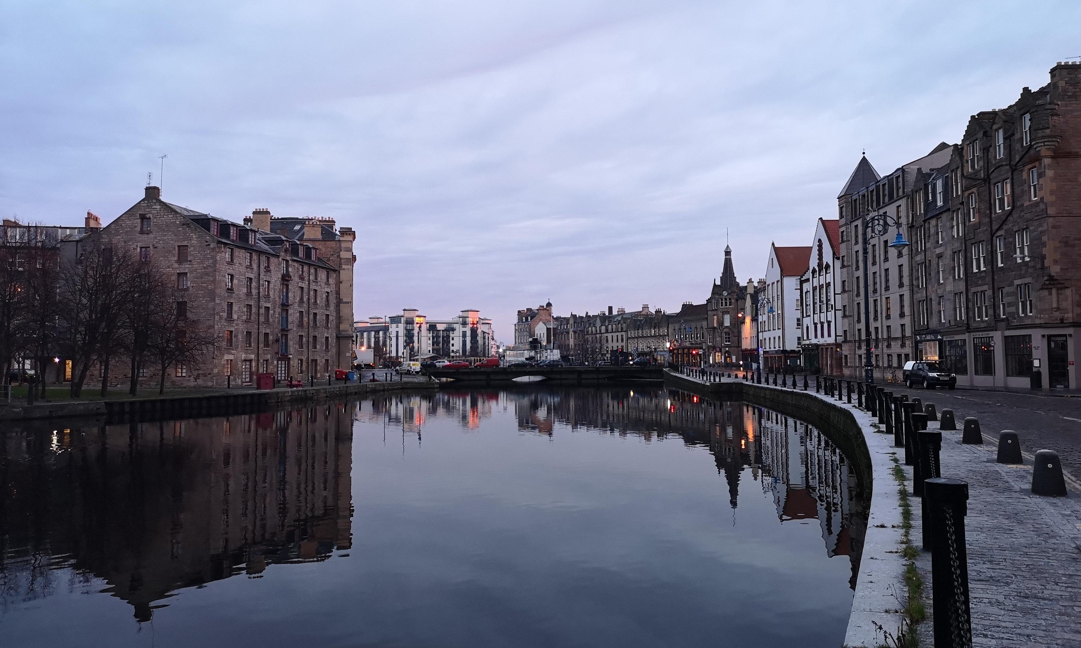 Houses in Leith next to a body of water.