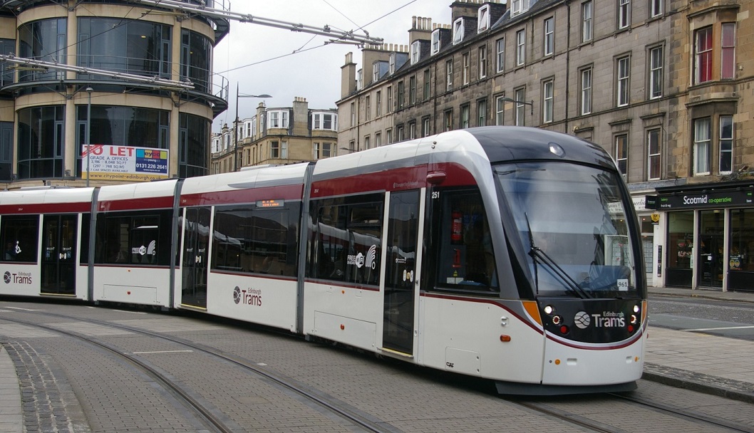 A tram driving through Edinburgh.