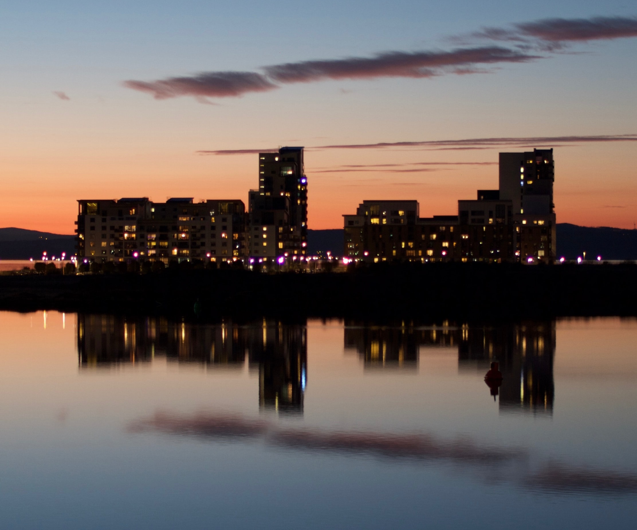 Two buildings in the distance.